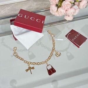 Gucci Gold Bracelet with Charms